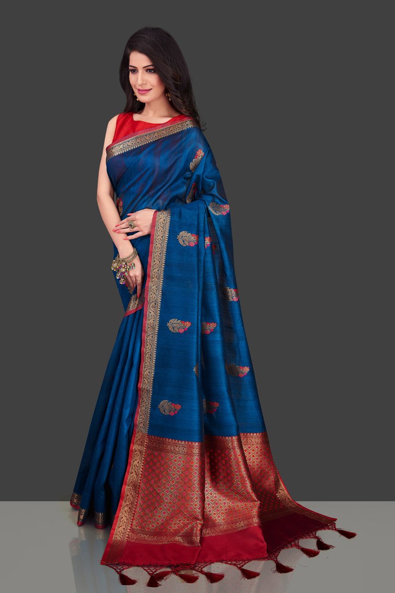 Shop dark blue Banarasi tassar saree in USA with floral zari buta. Shop beautiful Banarasi georgette sarees, tussar saris, pure muga silk saris in USA from Pure Elegance Indian fashion boutique in USA. Get spoiled for choices with a splendid variety of Indian sarees to choose from! Shop now.-side