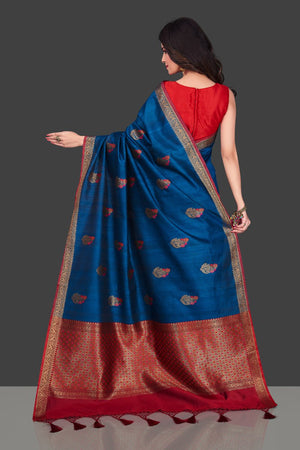 Shop dark blue Banarasi tassar saree in USA with floral zari buta. Shop beautiful Banarasi georgette sarees, tussar saris, pure muga silk saris in USA from Pure Elegance Indian fashion boutique in USA. Get spoiled for choices with a splendid variety of Indian sarees to choose from! Shop now.-back