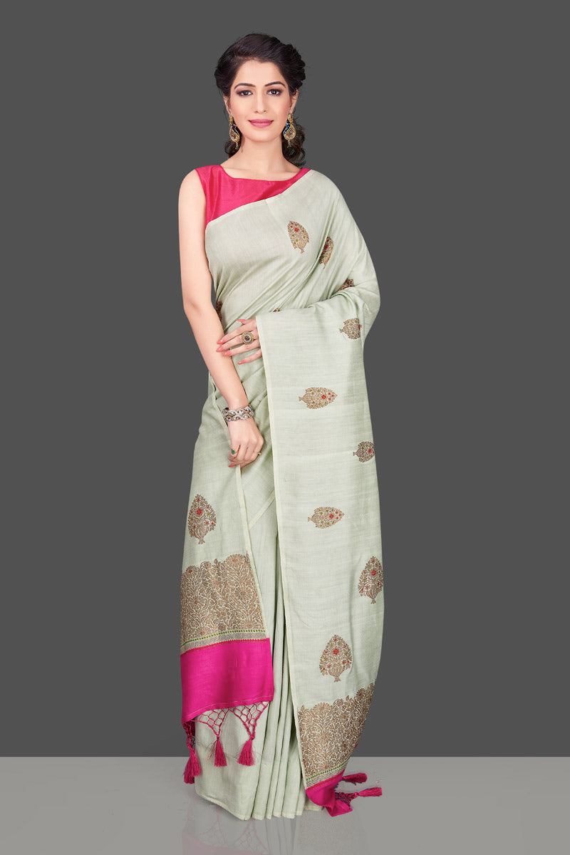 Shop beautiful mint green muga Banarasi saree in USA with zari floral buta. Shop beautiful Banarasi georgette sarees, tussar saris, pure muga silk saris in USA from Pure Elegance Indian fashion boutique in USA. Get spoiled for choices with a splendid variety of Indian sarees to choose from! Shop now.-full view