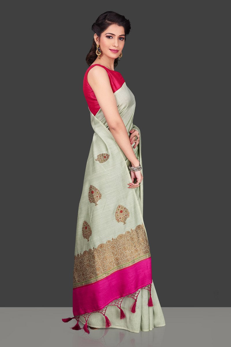 Shop beautiful mint green muga Banarasi saree in USA with zari floral buta. Shop beautiful Banarasi georgette sarees, tussar saris, pure muga silk saris in USA from Pure Elegance Indian fashion boutique in USA. Get spoiled for choices with a splendid variety of Indian sarees to choose from! Shop now.-right side