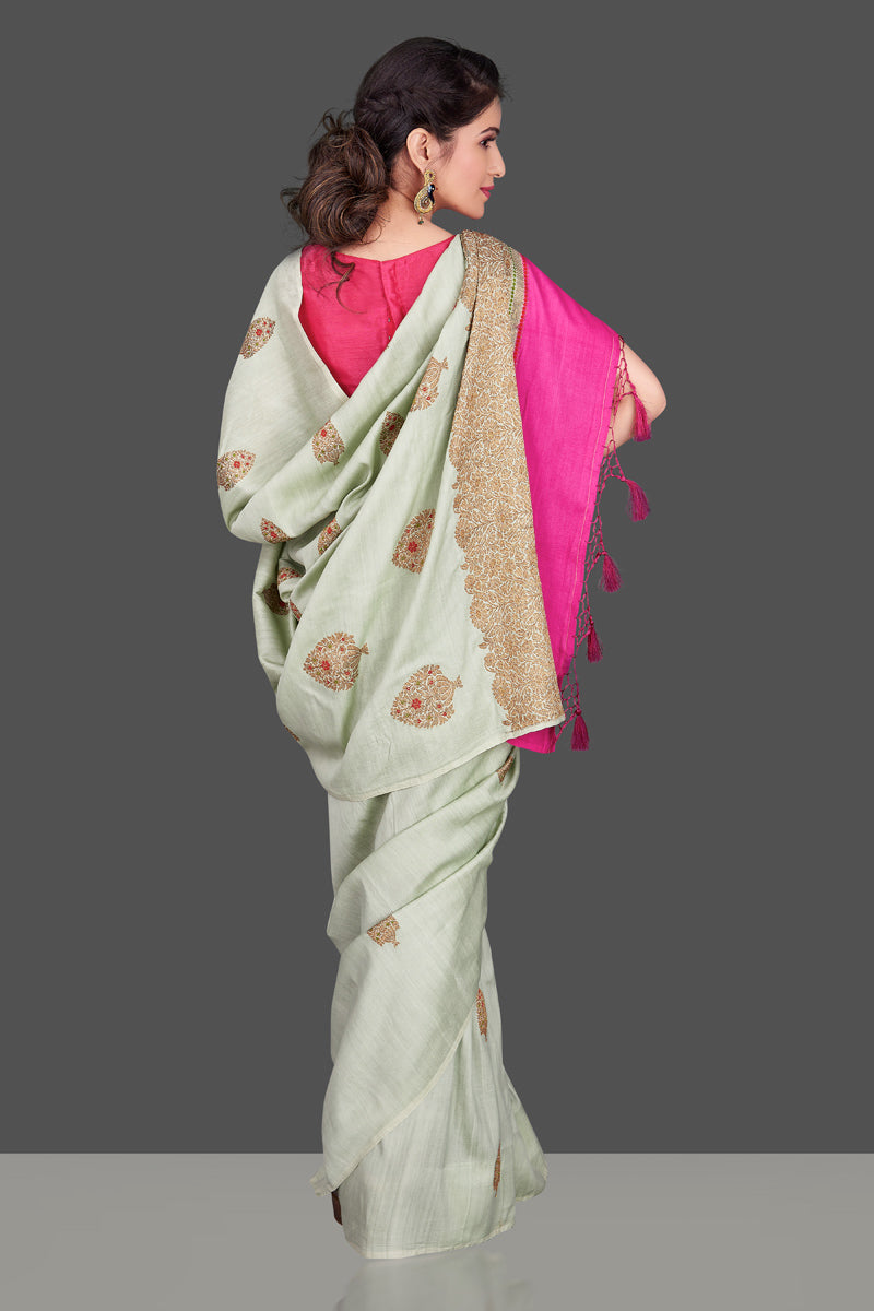 Shop beautiful mint green muga Banarasi saree in USA with zari floral buta. Shop beautiful Banarasi georgette sarees, tussar saris, pure muga silk saris in USA from Pure Elegance Indian fashion boutique in USA. Get spoiled for choices with a splendid variety of Indian sarees to choose from! Shop now.-back