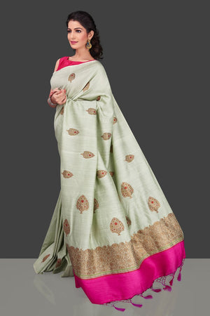 Shop beautiful mint green muga Banarasi saree in USA with zari floral buta. Shop beautiful Banarasi georgette sarees, tussar saris, pure muga silk saris in USA from Pure Elegance Indian fashion boutique in USA. Get spoiled for choices with a splendid variety of Indian sarees to choose from! Shop now.-left