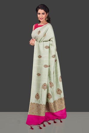 Shop beautiful mint green muga Banarasi saree in USA with zari floral buta. Shop beautiful Banarasi georgette sarees, tussar saris, pure muga silk saris in USA from Pure Elegance Indian fashion boutique in USA. Get spoiled for choices with a splendid variety of Indian sarees to choose from! Shop now.-side