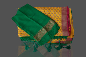 Buy online attractive yellow georgette Benarasi sari in USA with pink green zari border. Shop beautiful Banarasi georgette sarees, tussar saris, pure muga silk saris in USA from Pure Elegance Indian fashion boutique in USA. Get spoiled for choices with a splendid variety of Indian sarees to choose from! Shop now.-details