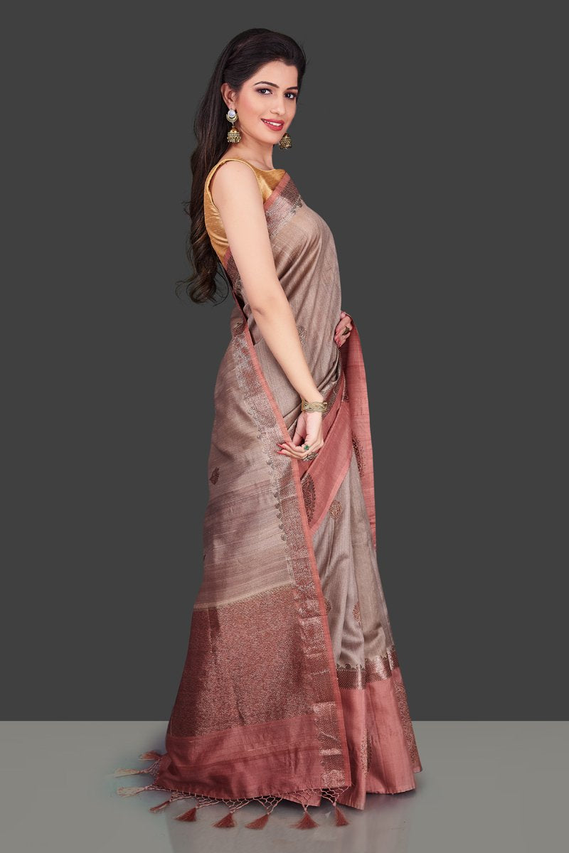 Shop attractive brown tassar Benarasi sari online in USA with zari buta on border. Shop beautiful Banarasi georgette sarees, tussar saris, pure muga silk saris in USA from Pure Elegance Indian fashion boutique in USA. Get spoiled for choices with a splendid variety of Indian sarees to choose from! Shop now.-right