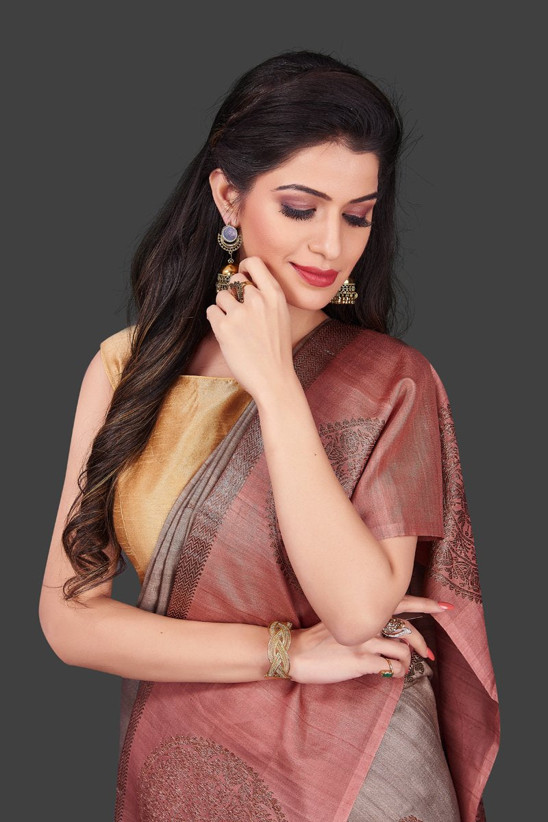 Shop attractive brown tassar Benarasi sari online in USA with zari buta on border. Shop beautiful Banarasi georgette sarees, tussar saris, pure muga silk saris in USA from Pure Elegance Indian fashion boutique in USA. Get spoiled for choices with a splendid variety of Indian sarees to choose from! Shop now.-closeup