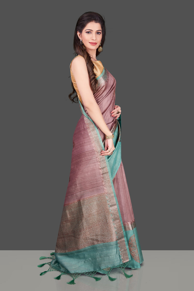 Buy beautiful mauve color tassar Benarasi saree online in USA with zari buta on green border. Shop beautiful Banarasi georgette sarees, tussar saris, pure muga silk saris in USA from Pure Elegance Indian fashion boutique in USA. Get spoiled for choices with a splendid variety of Indian sarees to choose from! Shop now.-side