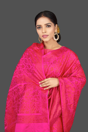 Shop bright pink tanchoi Benarasi sari online in USA. Be the center of attraction at weddings and parties with your captivating ethnic style in beautiful Banarsi silk sarees. tanchoi saris from Pure Elegance Indian fashion store in USA.-closeup