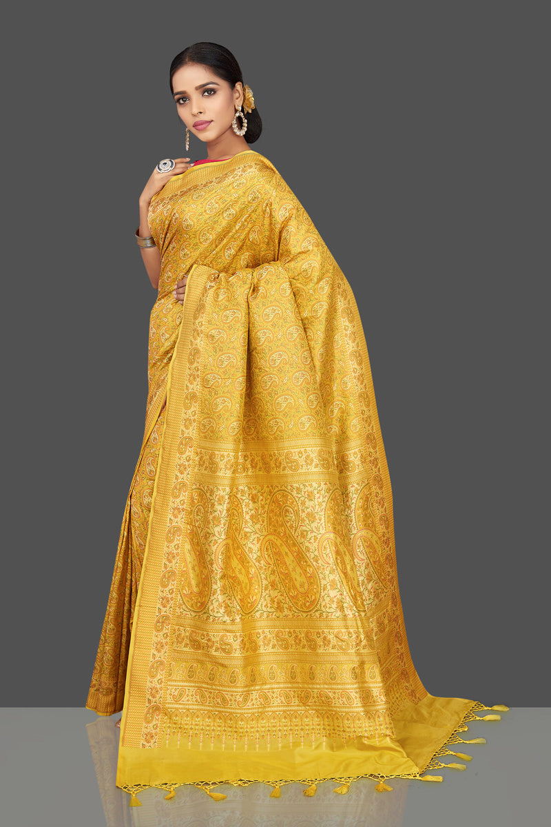 Buy stunning yellow tanchui Banarasi sari online in USA. Be the center of attraction at weddings and parties with your captivating ethnic style in beautiful Banarsi silk saris. tanchoi sarees from Pure Elegance Indian fashion store in USA.-front