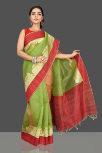 Buy green organza Banarasi saree online in USA with zari work on red border. Be the center of attraction at weddings and parties with your captivating ethnic style in beautiful Banarsi silk saris. tanchoi sarees from Pure Elegance Indian fashion store in USA.-full view