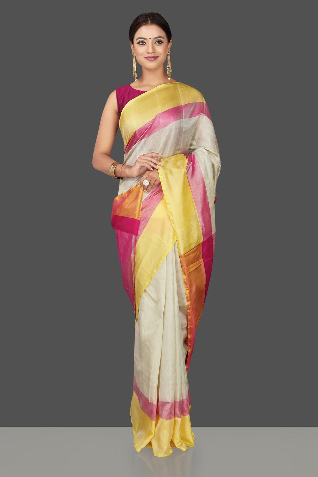Buy beautiful off-white  Uppada silk saree online in USA with pink and yellow border. Keep it elegant with handwoven silk sarees, Uppada silk sarees from Pure Elegance Indian fashion boutique in USA.-full view