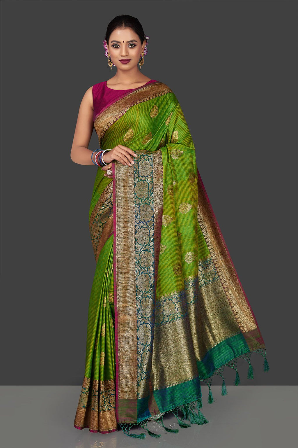 Buy light green tassar Banarasi saree online in USA with antique zari sea green border and zari buta. Garner compliments on weddings and special occasions with exquisite Banarasi saris, handwoven silk sarees, tussar sarees from Pure Elegance Indian fashion store in USA.-full view