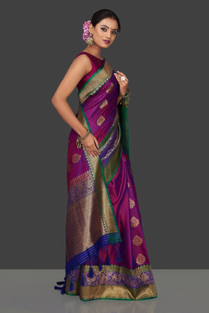 Buy bluish purple tassar Benarasi saree online in USA with antique zari blue-green border and zari buta. Garner compliments on weddings and special occasions with exquisite Banarasi saris, handwoven silk sarees, tussar sarees from Pure Elegance Indian fashion store in USA.-side