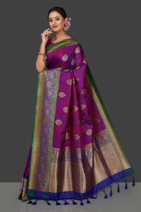 Buy bluish purple tassar Benarasi saree online in USA with antique zari blue-green border and zari buta. Garner compliments on weddings and special occasions with exquisite Banarasi saris, handwoven silk sarees, tussar sarees from Pure Elegance Indian fashion store in USA.-full view
