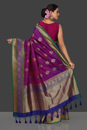 Buy bluish purple tassar Benarasi saree online in USA with antique zari blue-green border and zari buta. Garner compliments on weddings and special occasions with exquisite Banarasi saris, handwoven silk sarees, tussar sarees from Pure Elegance Indian fashion store in USA.-back