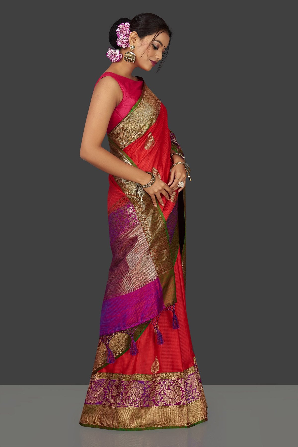 Shop stunning reddish orange tussar Banarasi sari online in USA with pink zari border. Garner compliments on weddings and special occasions with exquisite Banarasi saris, handwoven silk sarees, tussar sarees from Pure Elegance Indian fashion store in USA.-side