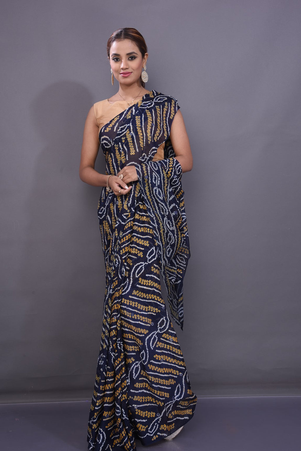 Shop attractive dark blue Bandhej print chiffon sari online in USA. Stand out at weddings and festive occasions with your tasteful choice in this gorgeous chiffon saris,  printed sarees, Bandhej saris, handwoven sarees from Pure Elegance Indian fashion store in USA. -full view