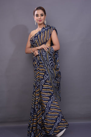 Shop attractive dark blue Bandhej print chiffon sari online in USA. Stand out at weddings and festive occasions with your tasteful choice in this gorgeous chiffon saris,  printed sarees, Bandhej saris, handwoven sarees from Pure Elegance Indian fashion store in USA. -pallu
