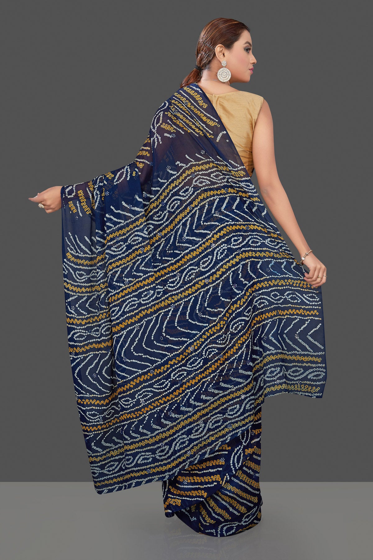 Shop attractive dark blue Bandhej print chiffon sari online in USA. Stand out at weddings and festive occasions with your tasteful choice in this gorgeous chiffon saris,  printed sarees, Bandhej saris, handwoven sarees from Pure Elegance Indian fashion store in USA. -back