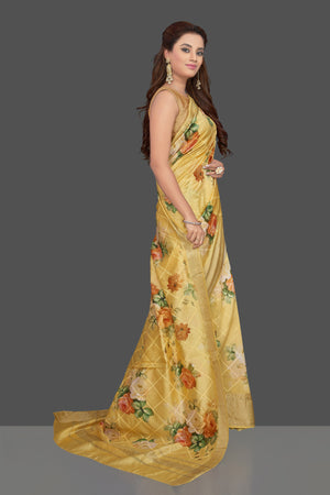Buy beautiful yellow floral print muga silk saree online in USA with zari border. Make you presence felt with your Indian style on special occasions in beautiful designer sarees, handwoven sarees, muga sarees, tussar silk sarees from Pure Elegance Indian fashion store in USA.-side