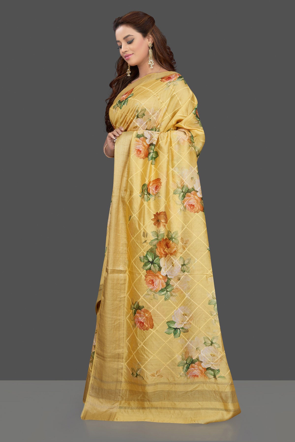 Buy beautiful yellow floral print muga silk saree online in USA with zari border. Make you presence felt with your Indian style on special occasions in beautiful designer sarees, handwoven sarees, muga sarees, tussar silk sarees from Pure Elegance Indian fashion store in USA.-pallu
