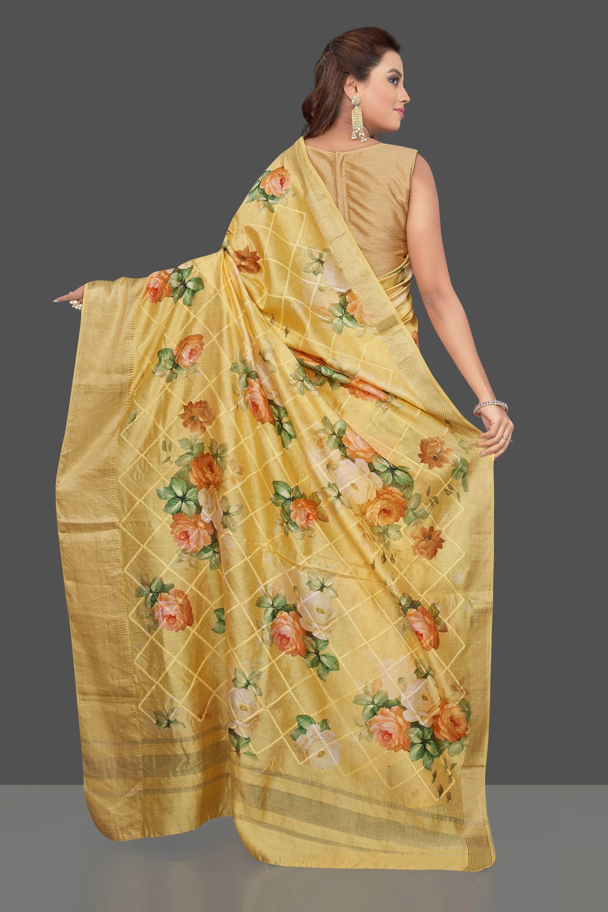 Buy beautiful yellow floral print muga silk saree online in USA with zari border. Make you presence felt with your Indian style on special occasions in beautiful designer sarees, handwoven sarees, muga sarees, tussar silk sarees from Pure Elegance Indian fashion store in USA.-back