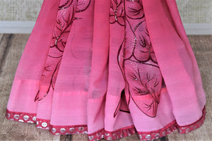 Shop lovely pink leaf print chiffon saree online in USA with strappy blouse. Be the center of attraction at parties and weddings with beautiful georgette sarees, embroidered sarees, printed sarees, Banarasi saris from Pure Elegance Indian fashion store in USA.-pleats