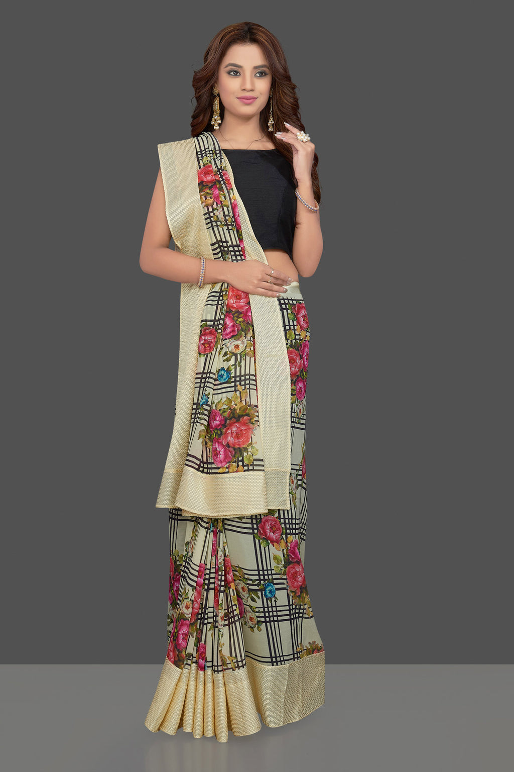 Shop lovely cream floral and check print georgette sari online in USA. Make you presence felt with your Indian style on special occasions in beautiful designer sarees, crepe silk sarees, georgette saris, printed sarees from Pure Elegance Indian fashion store in USA.-full view