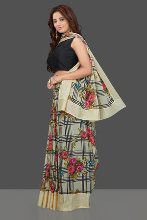 Shop lovely cream floral and check print georgette sari online in USA. Make you presence felt with your Indian style on special occasions in beautiful designer sarees, crepe silk sarees, georgette saris, printed sarees from Pure Elegance Indian fashion store in USA.-side