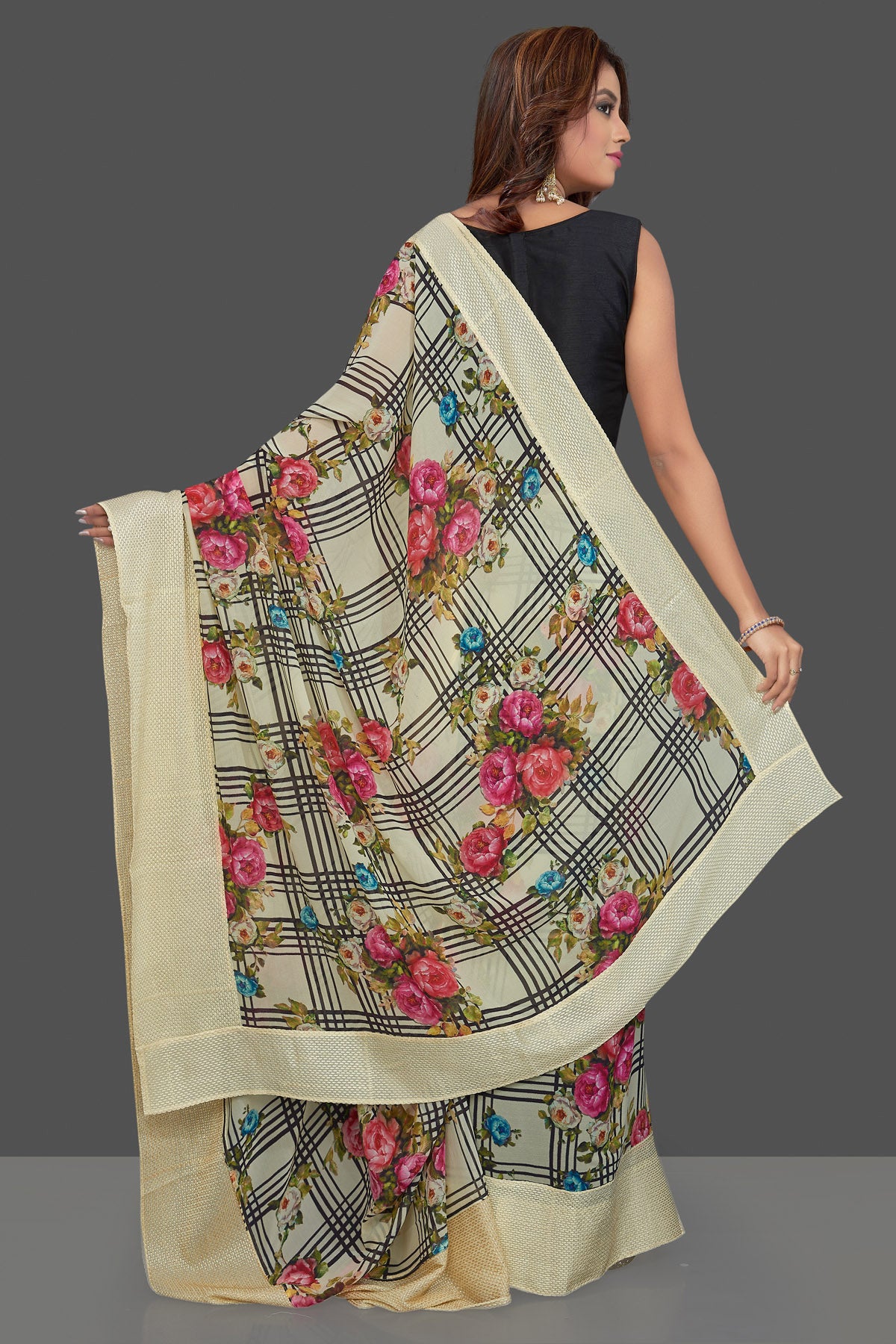Shop lovely cream floral and check print georgette sari online in USA. Make you presence felt with your Indian style on special occasions in beautiful designer sarees, crepe silk sarees, georgette saris, printed sarees from Pure Elegance Indian fashion store in USA.-back