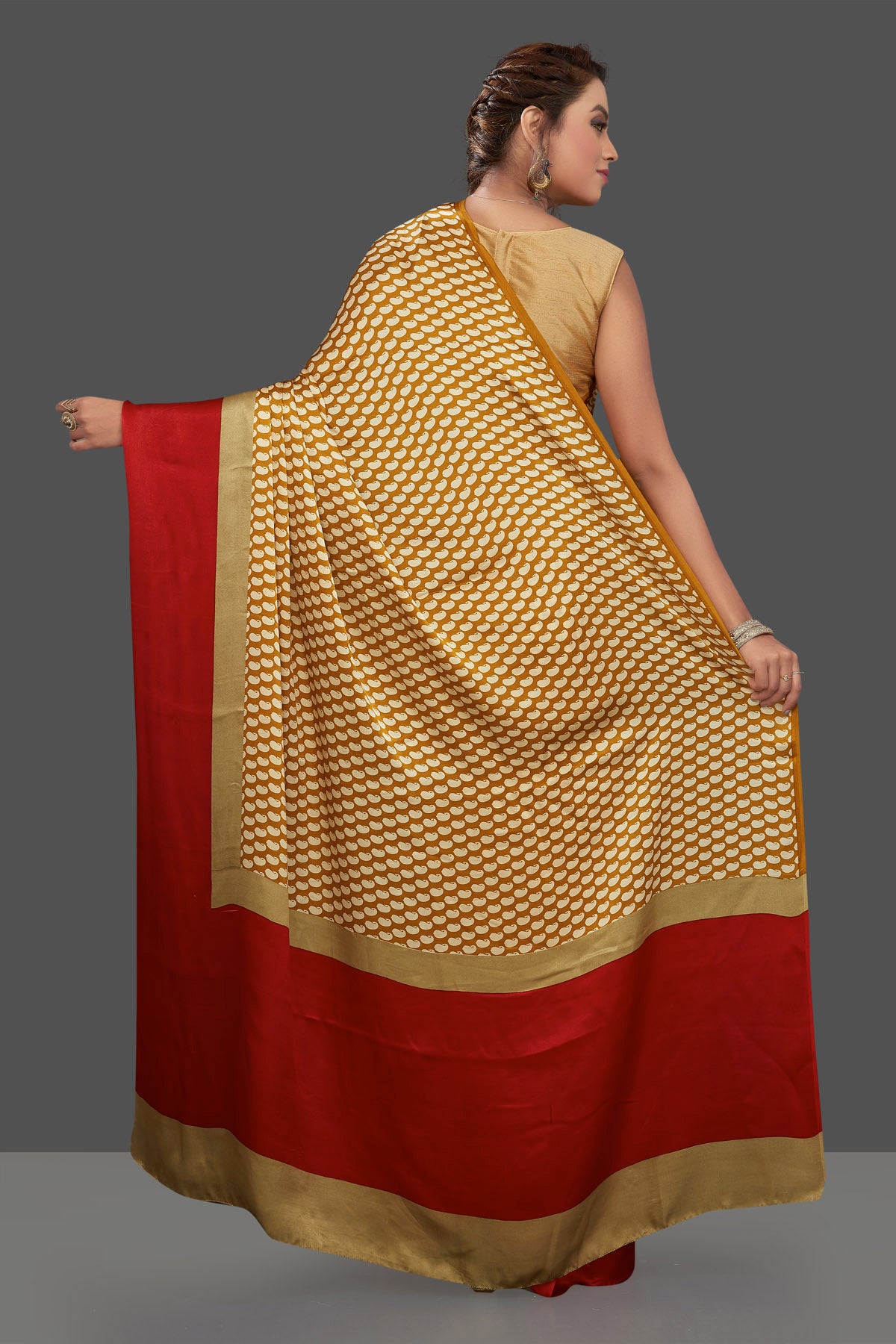 Shop mustard printed crepe silk saree online in USA with solid red border. Elevate your Indian style on special occasions in beautiful designer sarees, crepe silk sarees, georgette saris, printed sarees from Pure Elegance Indian clothing store in USA.-back