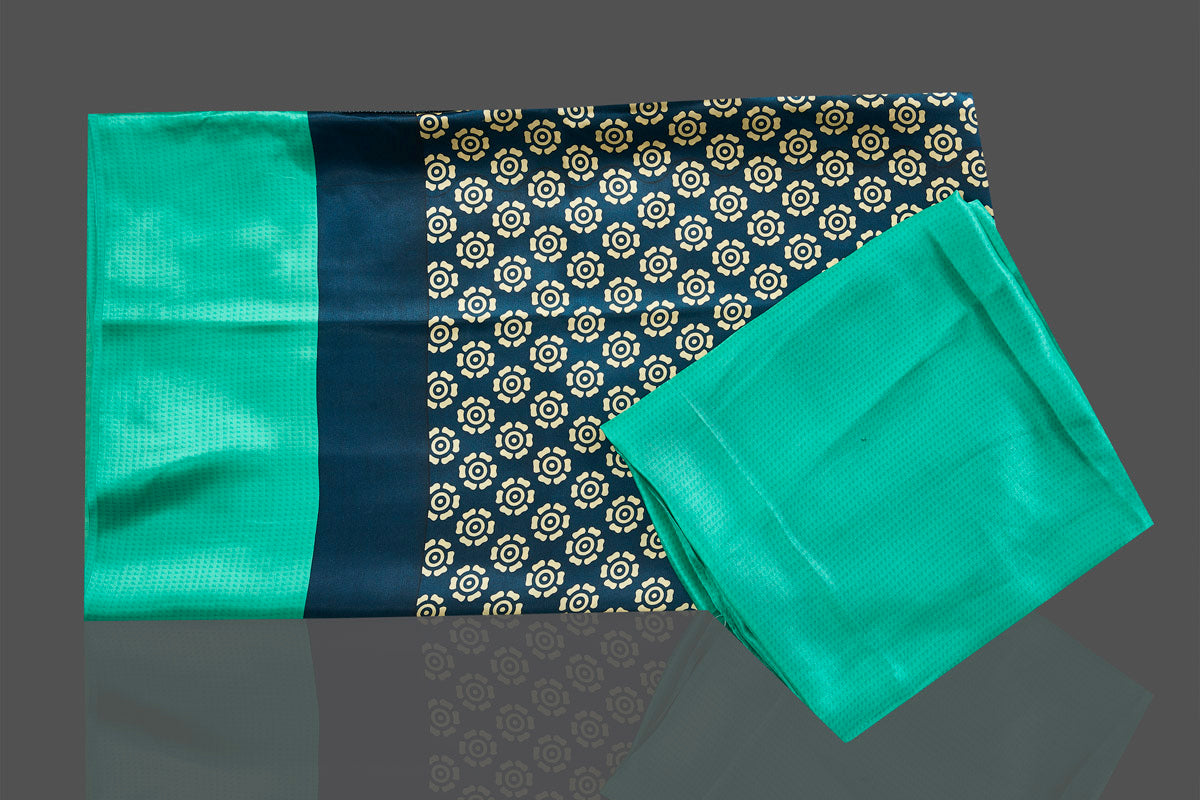 Buy elegant dark blue crepe silk sari online in USA with solid green border. Elevate your Indian style on special occasions in beautiful designer sarees, crepe silk sarees, georgette saris, printed sarees from Pure Elegance Indian clothing store in USA.-blouse