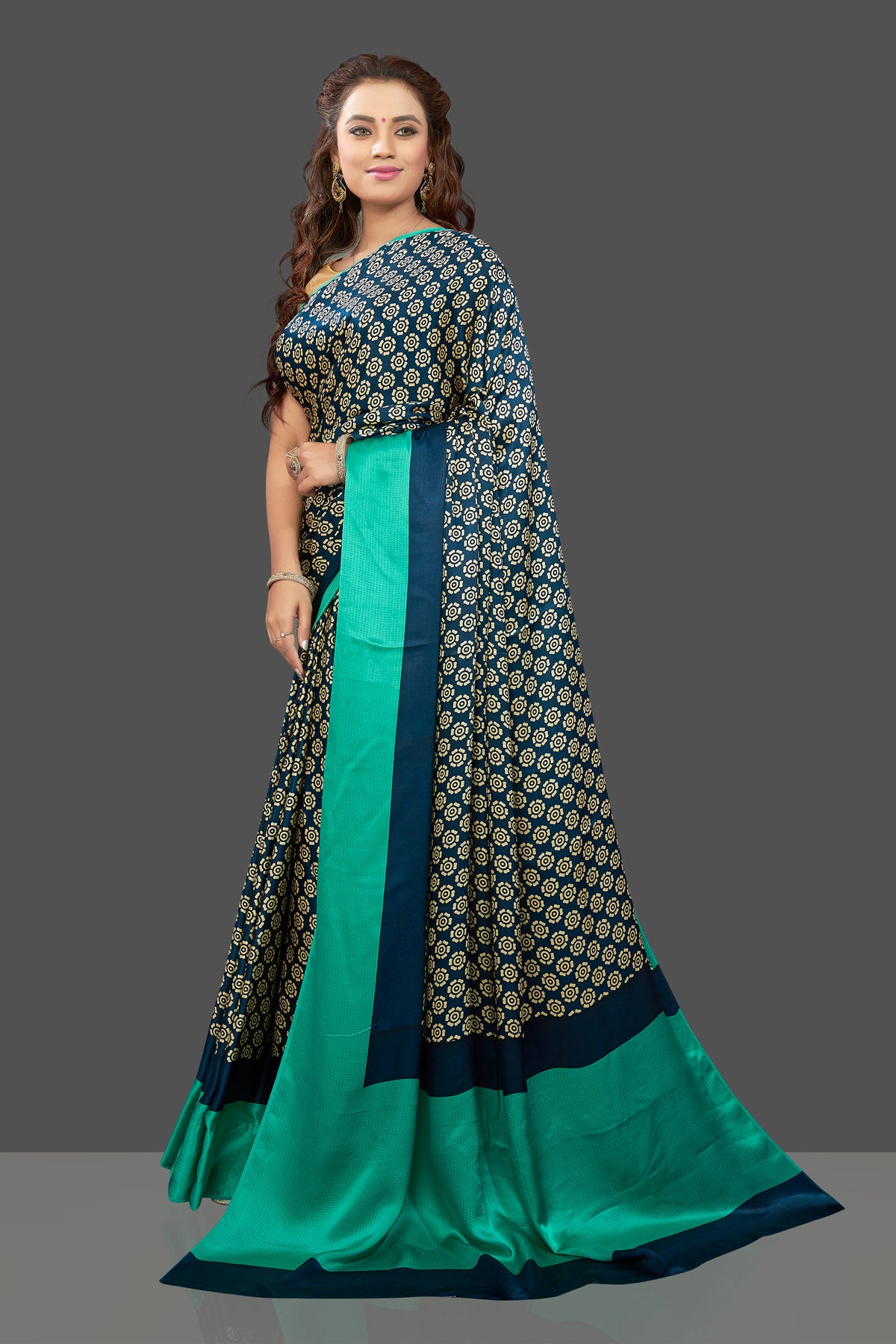 Buy elegant dark blue crepe silk sari online in USA with solid green border. Elevate your Indian style on special occasions in beautiful designer sarees, crepe silk sarees, georgette saris, printed sarees from Pure Elegance Indian clothing store in USA.-pallu