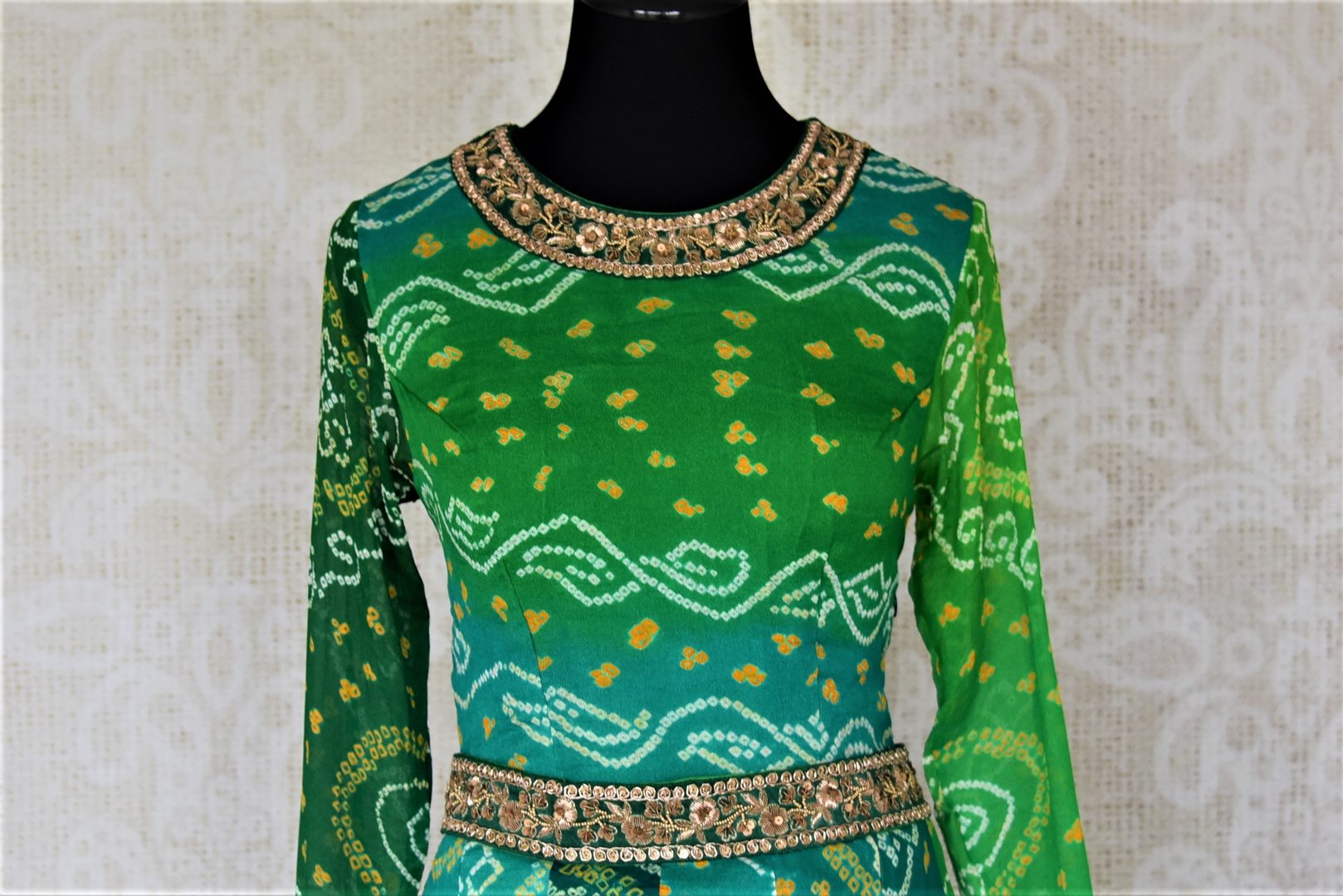Buy attractive two-tone green silk Bandhej hand embroidered sharara suit online in USA with tiered sharara pants. Elevate your ethnic style on weddings and festive occasions with stunning designer Anarkali suits, sharara suits, palazzo suits, salwar suits from Pure Elegance Indian fashion boutique in USA.-front