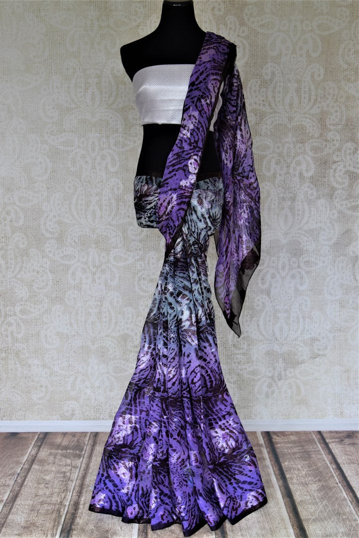 Buy stunning purple animal print georgette saree online in USA with. Elevate your ethnic style on weddings and festive occasions with stunning designer sarees, pure silk sarees, georgette sarees, printed sarees from Pure Elegance Indian fashion boutique in USA.-full view