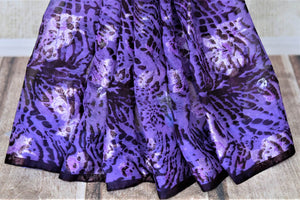 Buy stunning purple animal print georgette saree online in USA with. Elevate your ethnic style on weddings and festive occasions with stunning designer sarees, pure silk sarees, georgette sarees, printed sarees from Pure Elegance Indian fashion boutique in USA.-pleats