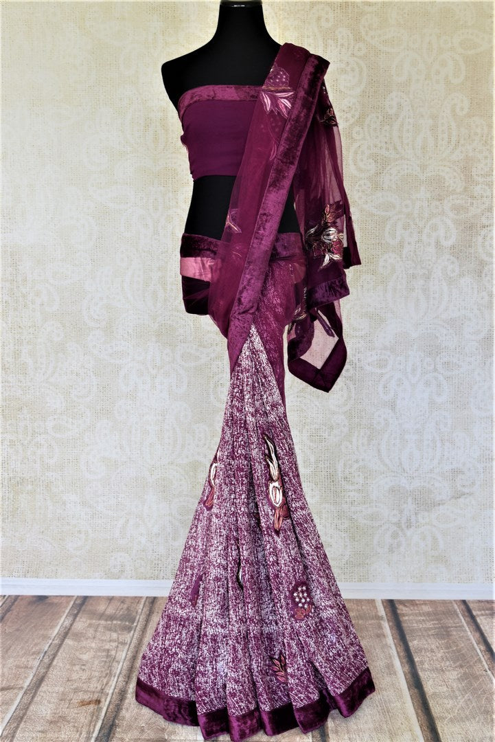 Shop purple half and half applique work net and georgette saree online in USA with velvet border. Keep it elegant on special occasions and parties with stunning designer sarees, crepe sarees, fancy sarees, Bollywood sarees from Pure Elegance Indian fashion store in USA.-full view