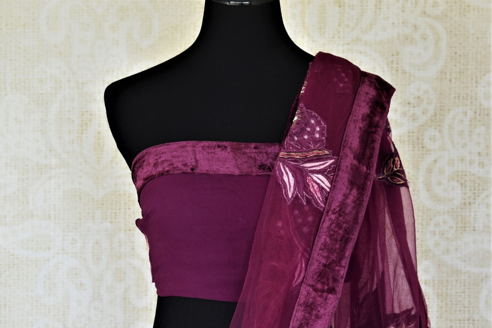 Shop purple half and half applique work net and georgette saree online in USA with velvet border. Keep it elegant on special occasions and parties with stunning designer sarees, crepe sarees, fancy sarees, Bollywood sarees from Pure Elegance Indian fashion store in USA.-blouse pallu