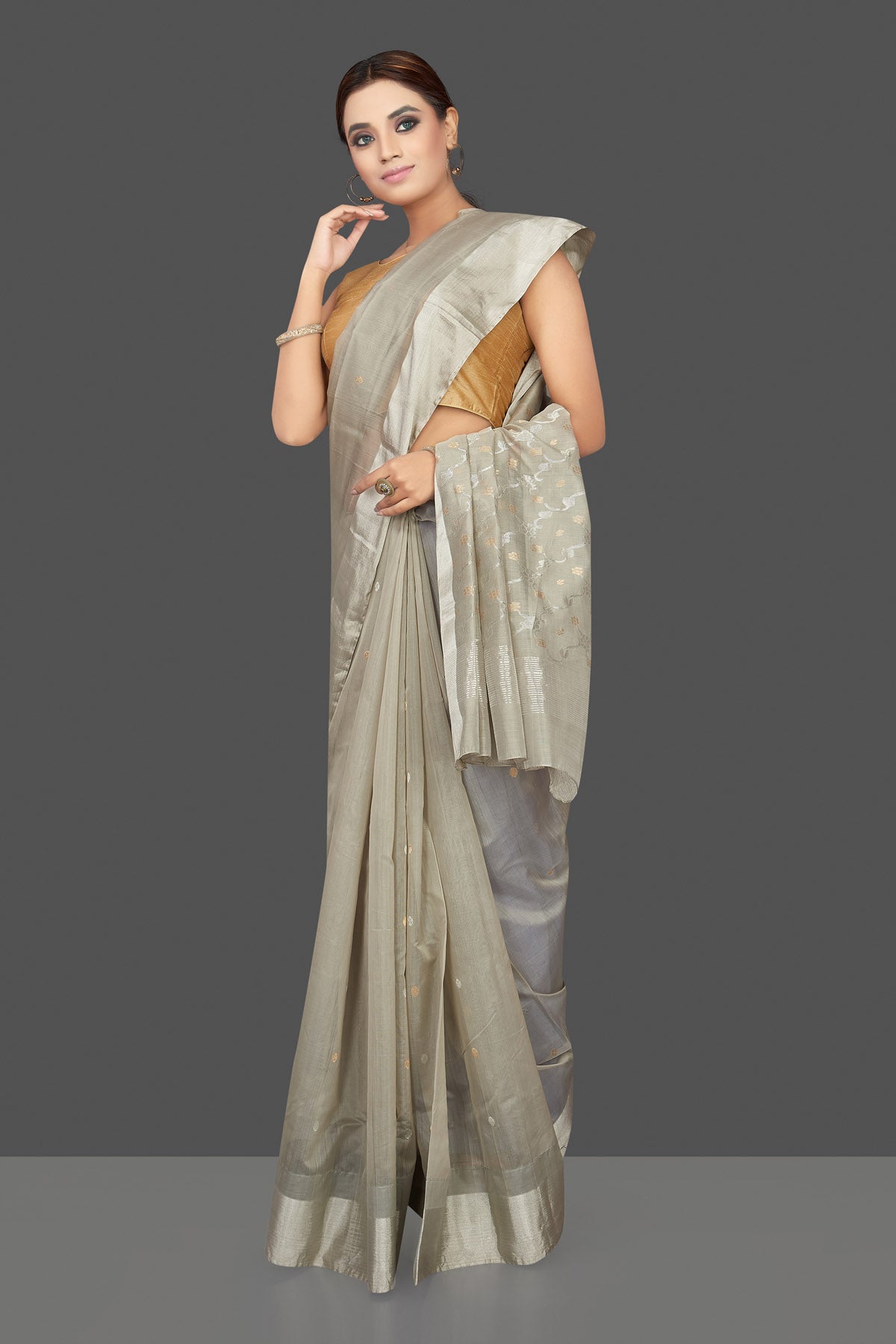 Shop attractive light grey Chanderi silk saree online in USA with silver zari border. Flaunt Indian fashion on special occasions in gorgeous chanderi sarees, pure silk sarees, Banarasi sarees, zari work sarees from Pure Elegance Indian fashion boutique in USA.-full view