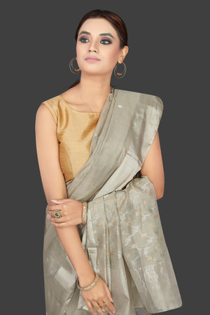 Shop attractive light grey Chanderi silk saree online in USA with silver zari border. Flaunt Indian fashion on special occasions in gorgeous chanderi sarees, pure silk sarees, Banarasi sarees, zari work sarees from Pure Elegance Indian fashion boutique in USA.-closeup