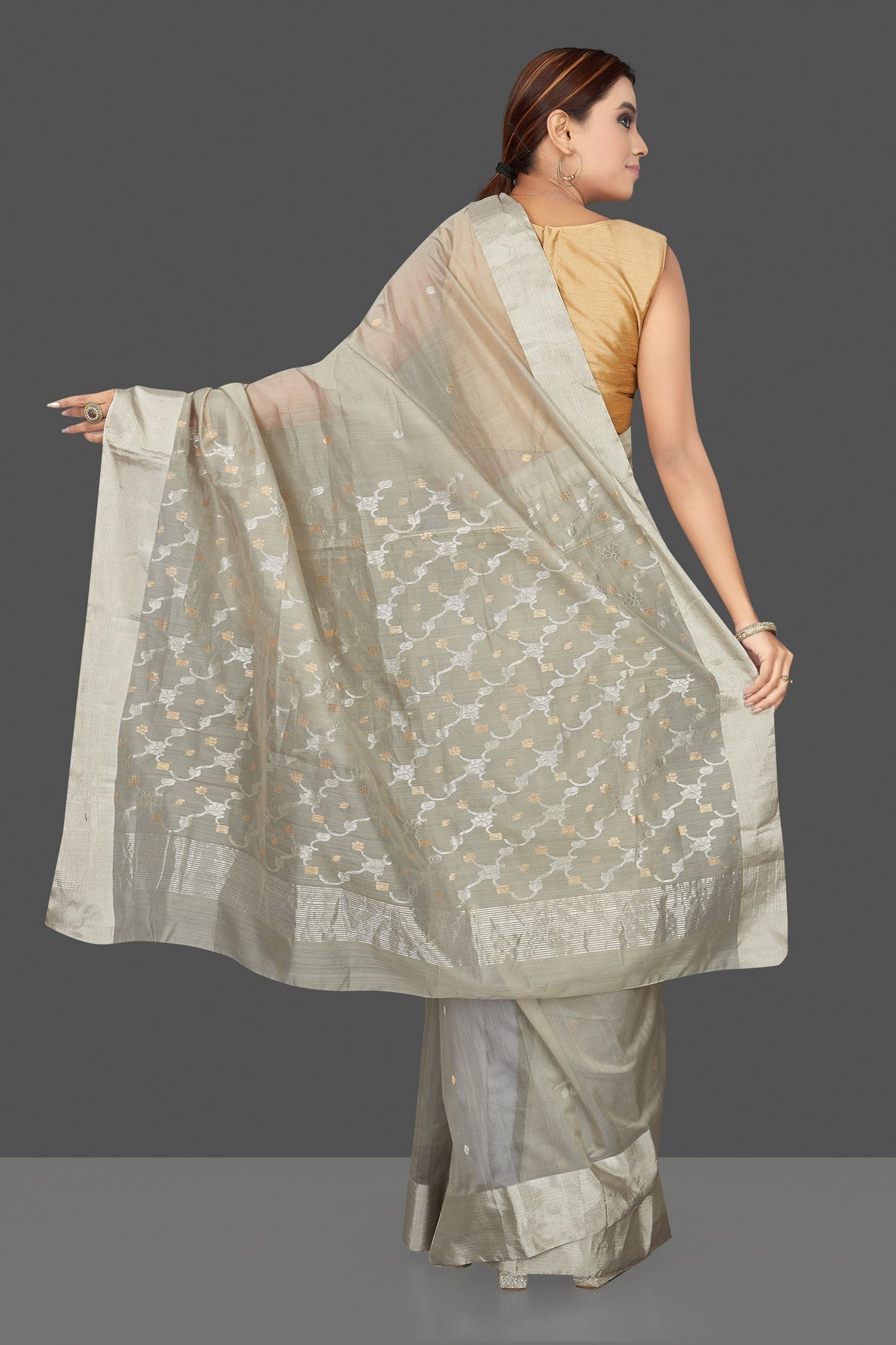Shop attractive light grey Chanderi silk saree online in USA with silver zari border. Flaunt Indian fashion on special occasions in gorgeous chanderi sarees, pure silk sarees, Banarasi sarees, zari work sarees from Pure Elegance Indian fashion boutique in USA.-back