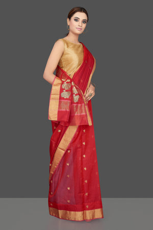 Shop stunning red Chanderi silk saree online in USA with golden zari minakari swan buta and zari border. Flaunt Indian fashion on special occasions in gorgeous chanderi sarees, pure silk sarees, Banarasi sarees, zari work sarees from Pure Elegance Indian fashion boutique in USA.-side