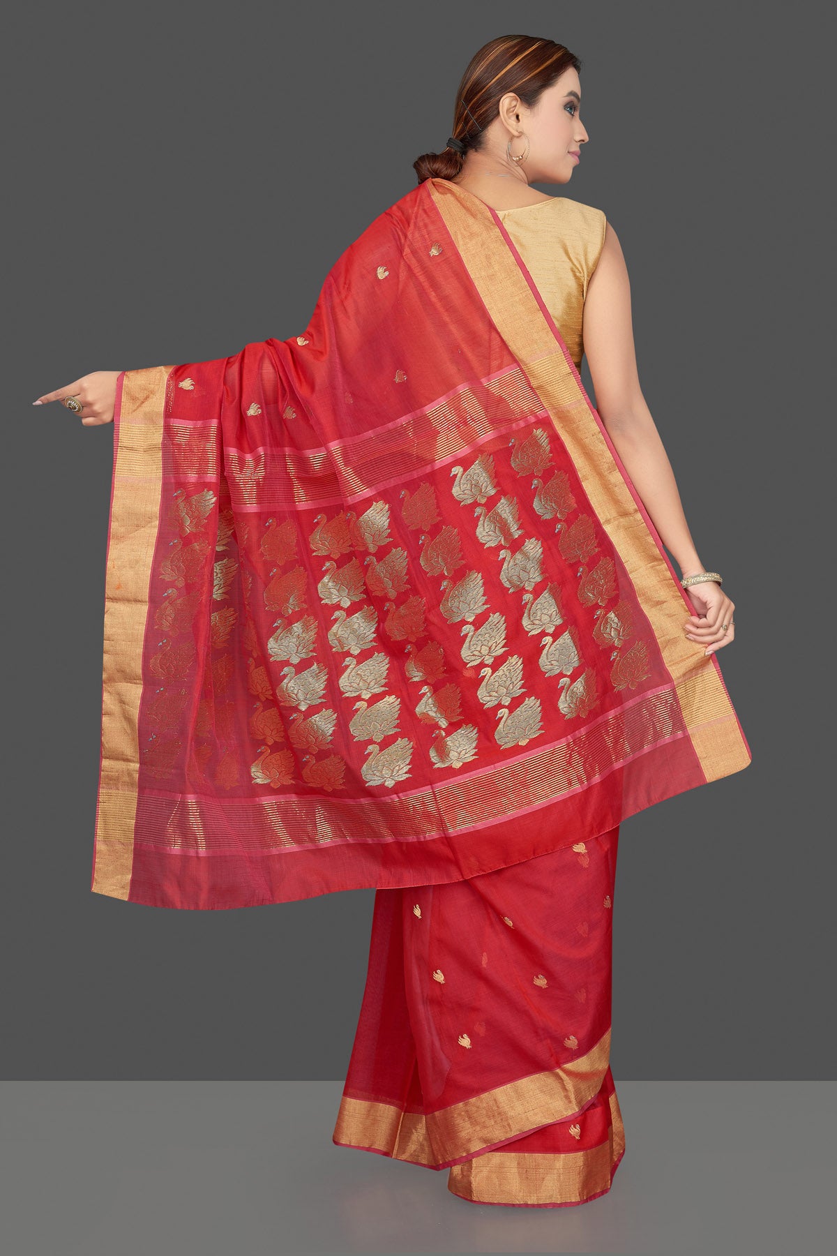 Shop stunning red Chanderi silk saree online in USA with golden zari minakari swan buta and zari border. Flaunt Indian fashion on special occasions in gorgeous chanderi sarees, pure silk sarees, Banarasi sarees, zari work sarees from Pure Elegance Indian fashion boutique in USA.-back