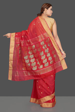 Shop stunning red Chanderi silk saree online in USA with golden zari minakari swan buta and zari border. Flaunt Indian fashion on special occasions in gorgeous chanderi sarees, pure silk sarees, Banarasi sarees, zari work sarees from Pure Elegance Indian fashion boutique in USA.-back