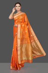 Buy stunning orange color chanderi silk sari online in USA with golden zari minakari flower buta and golden zari border. Flaunt Indian fashion on special occasions in gorgeous chanderi sarees, pure silk sarees, Banarasi sarees, zari work sarees from Pure Elegance Indian fashion boutique in USA.-full view