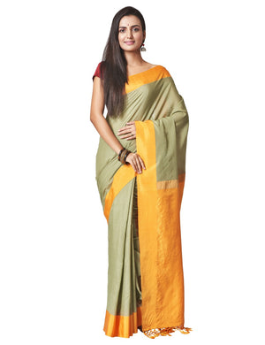 Buy lovely pistachio green silk cotton saree online in USA with solid yellow border. Enhance your festive look with pure silk sarees, embroidered sarees, designer sarees in USA from Pure Elegance Indian clothing store in USA.-front