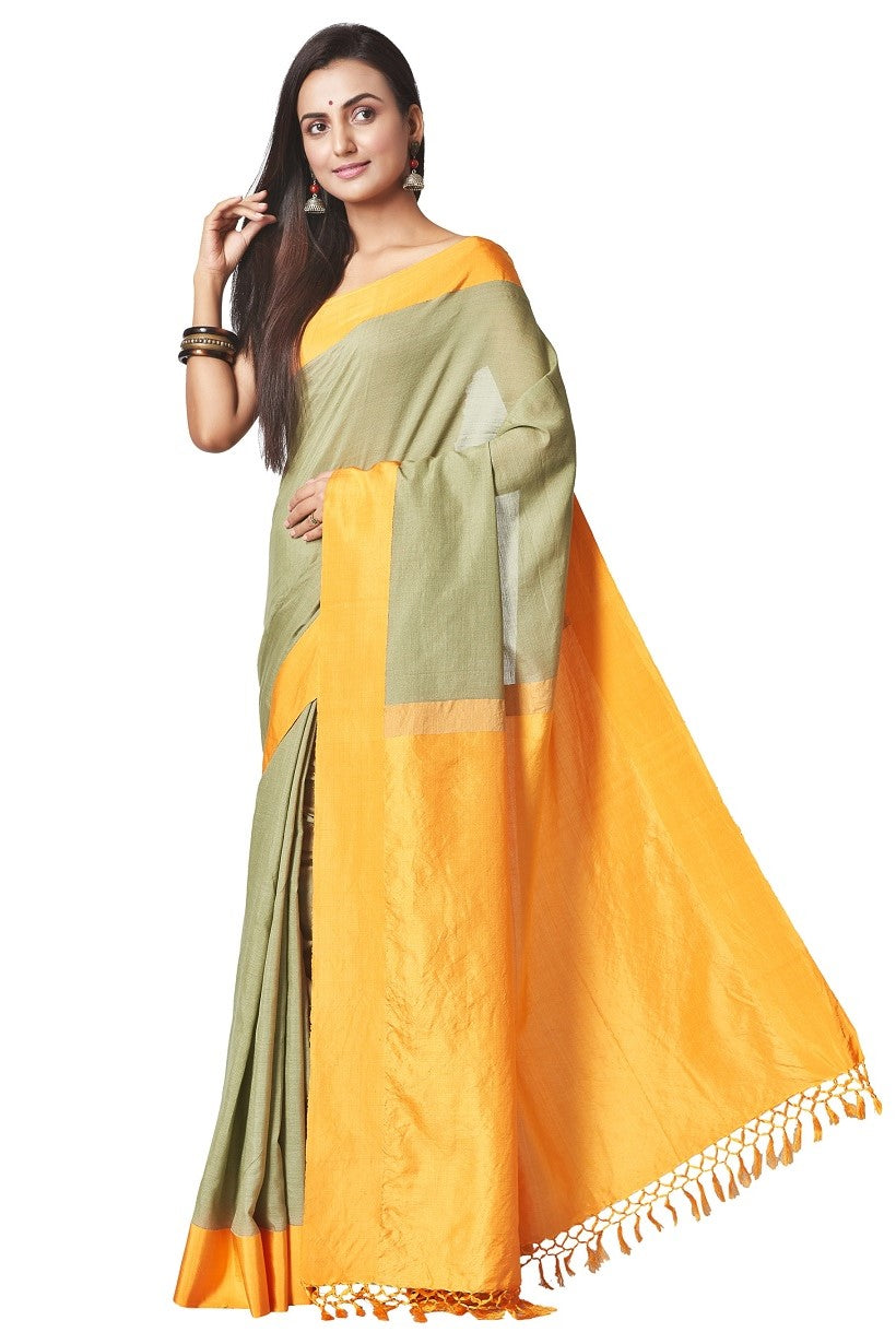 Buy lovely pistachio green silk cotton saree online in USA with solid yellow border. Enhance your festive look with pure silk sarees, embroidered sarees, designer sarees in USA from Pure Elegance Indian clothing store in USA.-full view