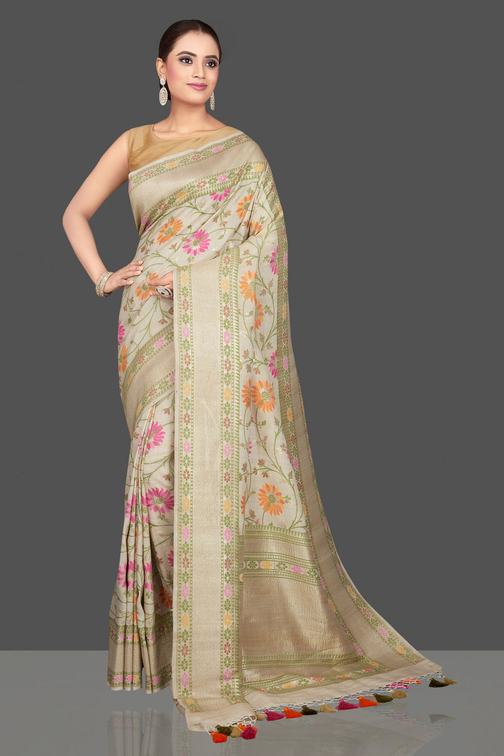 Shop stunning cream floral tussar georgette saree online in USA. Look gorgeous on special occasions with exquisite Indian sarees, handwoven sarees, Banarasi sarees, pure silk sarees from Pure Elegance Indian saree store in USA.-full view