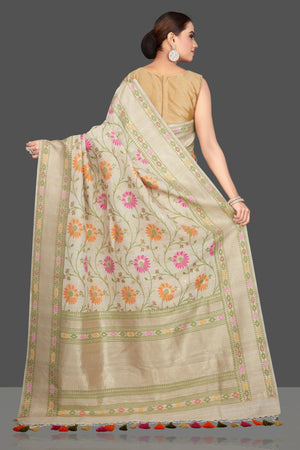 Shop stunning cream floral tussar georgette saree online in USA. Look gorgeous on special occasions with exquisite Indian sarees, handwoven sarees, Banarasi sarees, pure silk sarees from Pure Elegance Indian saree store in USA.-back