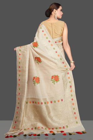 Buy beautiful off-white tussar georgette saree online in USA with zari border. Look gorgeous on special occasions with exquisite Indian sarees, handwoven sarees, Banarasi sarees, pure silk sarees from Pure Elegance Indian saree store in USA.-back